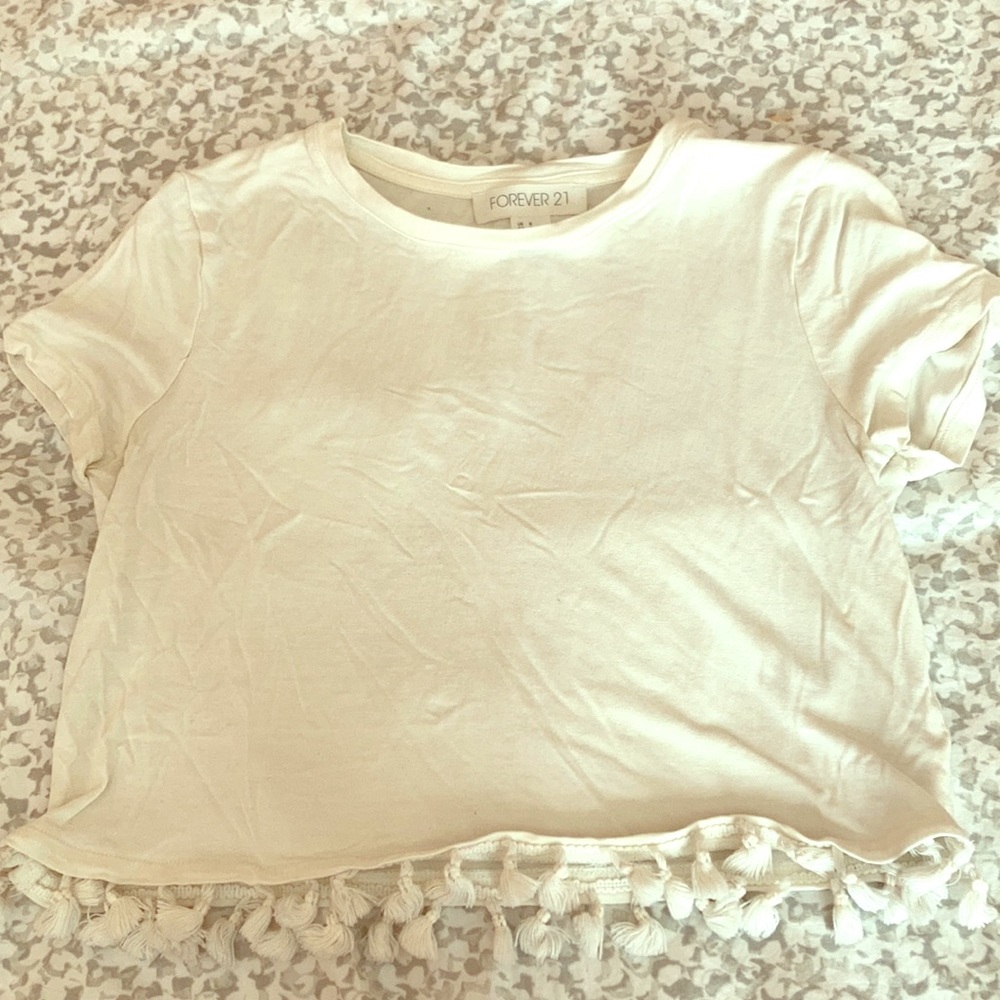 White top with tassel bottom